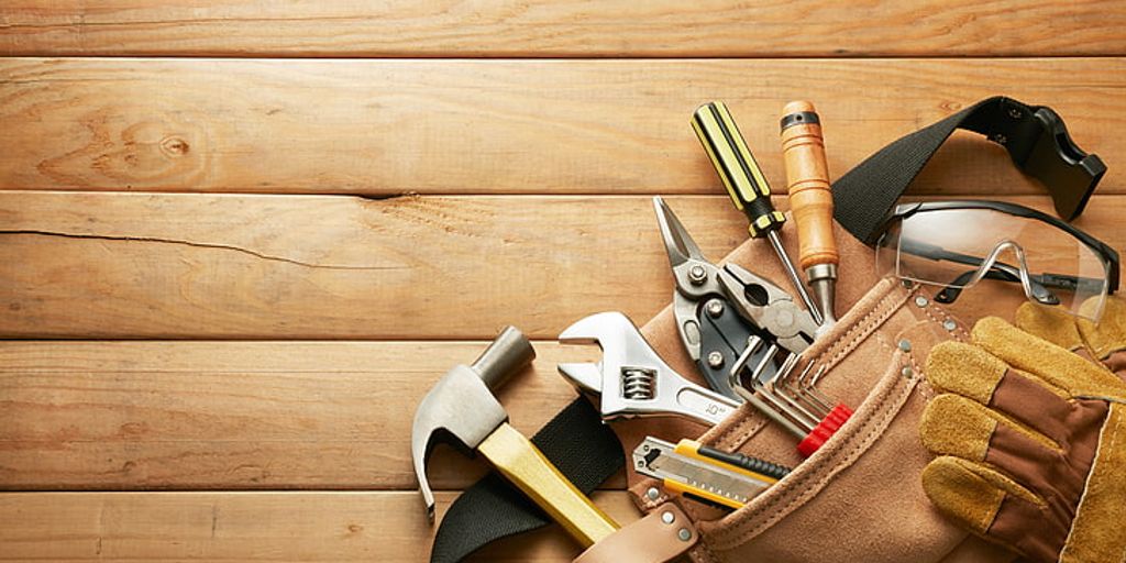 DIY home renovation tools and happy family working together